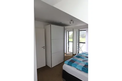 Ferienwohnung – Schlafzimmer